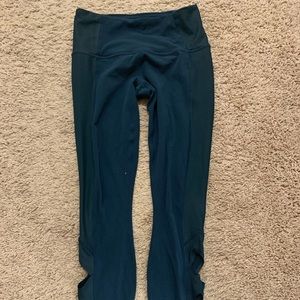 Blue athleta leggings with cutout details